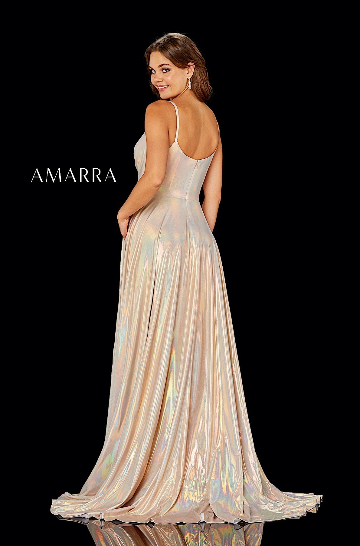 Woman wearing a glamorous dress with 'AMARRA' branding on a black background
