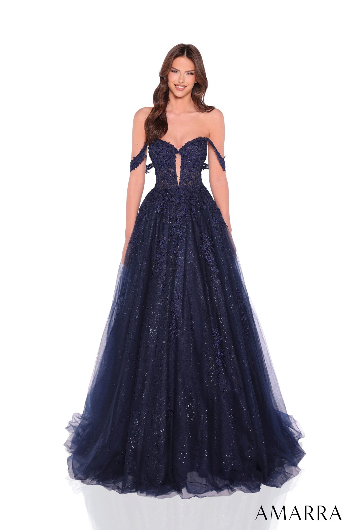 Navy blue evening gown with lace details on a white background, featuring the brand 'Amarra'. THE BRIDAL COMPANY