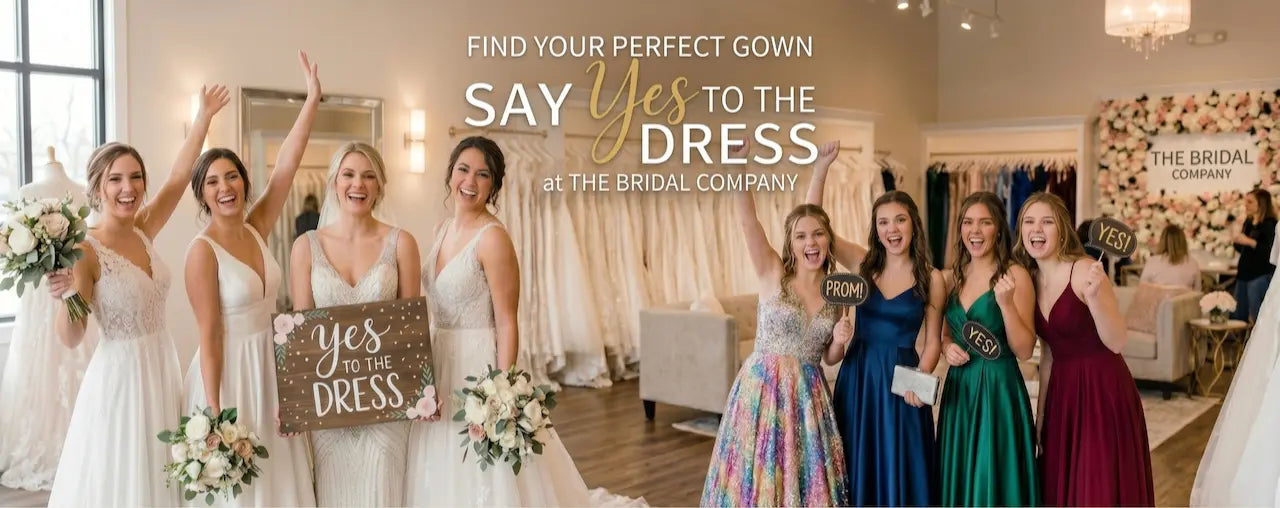 Group of women in bridal and formal dresses with 'Say Yes to the Dress' sign in a bridal store. t the bridal company brisbane gold coast
