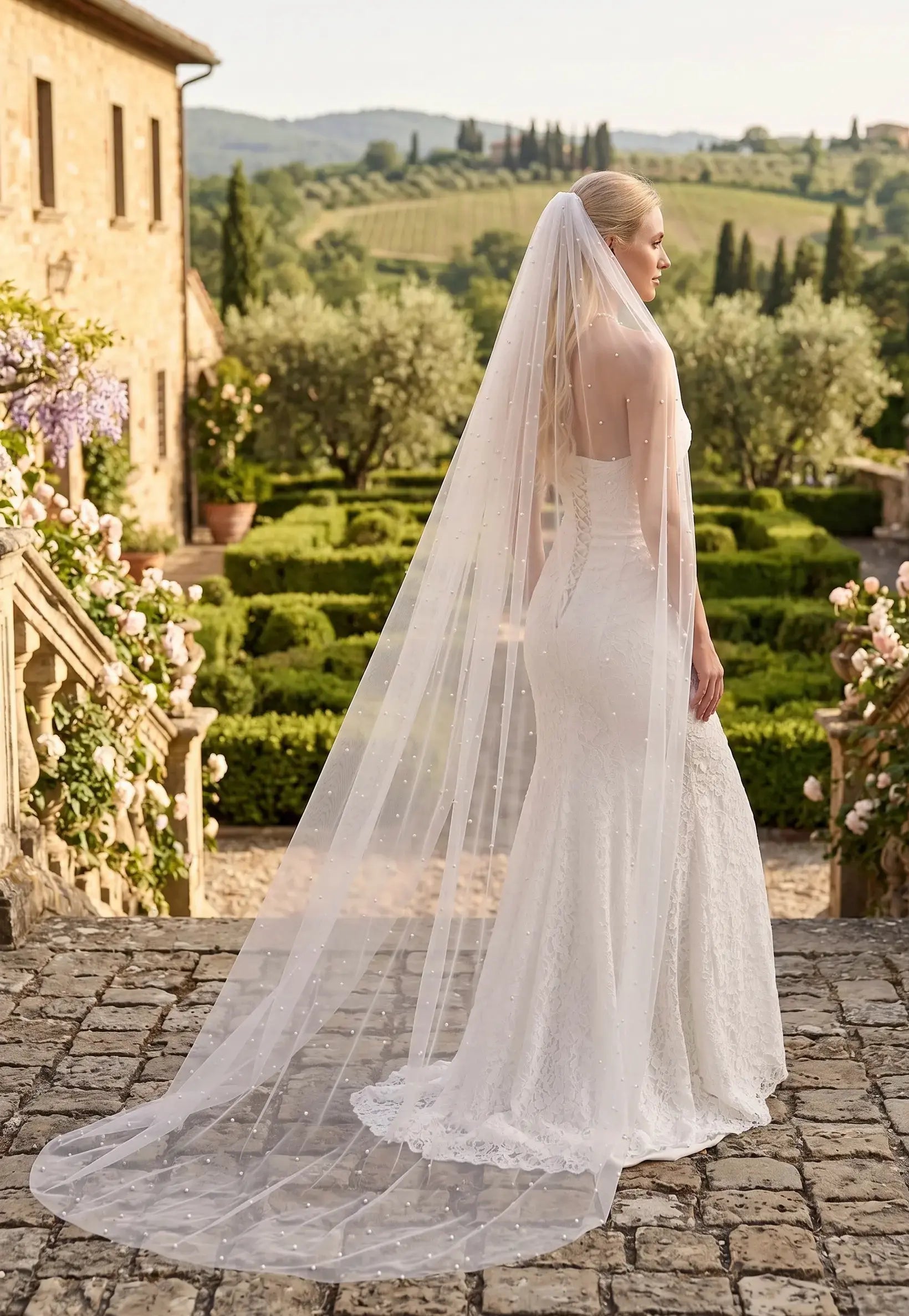 108-inch pearl wedding veil
Ivory cathedral veil with pearls